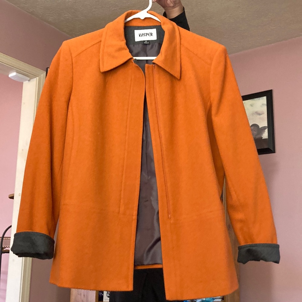 Orange Wool womenswear jacket.